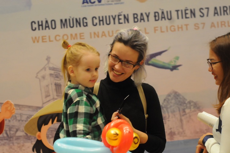 Passengers on the first flight to Cam Ranh International Terminal, Vietnam of S7 Airlines