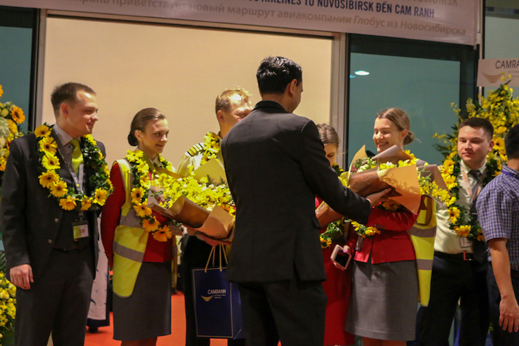 Mr. Sulaiman - Chief Operating Officer of Cam Ranh International Terminal gave flower to Globus Airlines' Flight crew