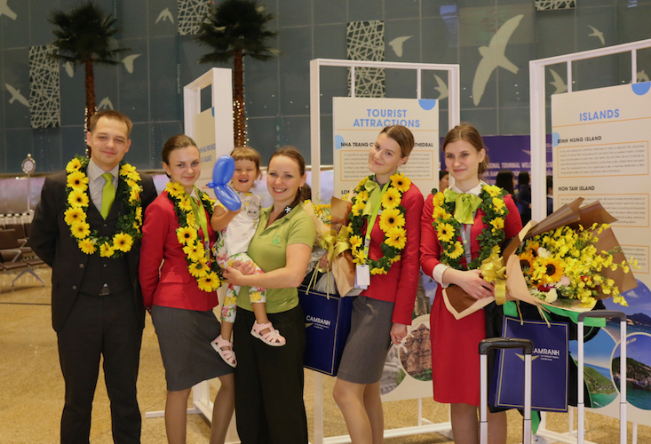 Our pretty little passenger seemed so happy with the Globus Airlines' Flight Attendants